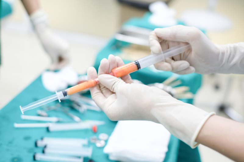 Hands,Transfer,Fat,From,Syringe,,Fat,Grafting